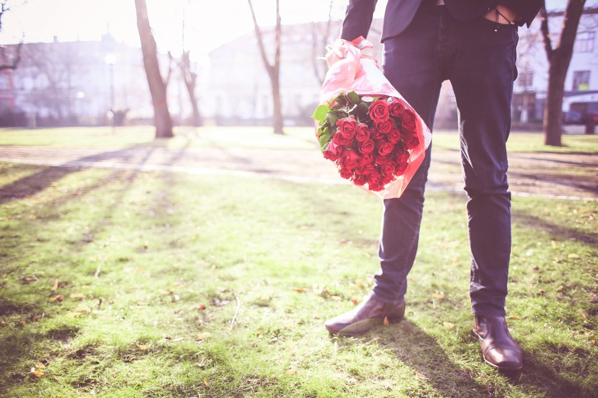man-with-roses-waiting-for-his-lady-picjumbo-com